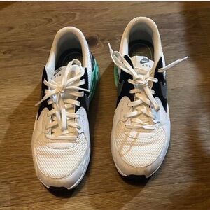 Nike Air White and Black Sneakers with Green Accent